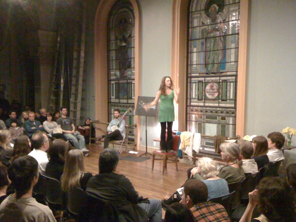 Adelind Horan performing in front of the stained glass windows of Judson Church in NYC